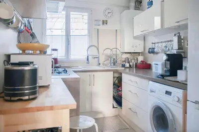 Cuisine ou kitchenette dans l'établissement Beautiful Bright Flat Near Jardin Des Plantes
