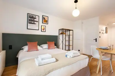 Un ou plusieurs lits dans un hébergement de l'établissement Amazing studio 2P - Buttes Chaumont