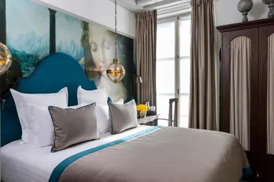 Un ou plusieurs lits dans un hébergement de l'établissement Hôtel & Spa Vinci Due