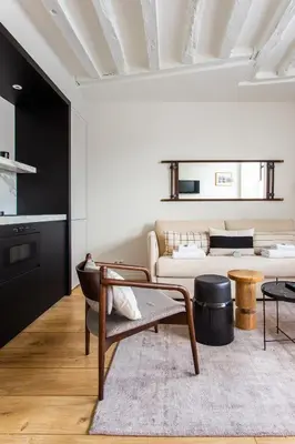 Coin salon dans l'établissement Cozy Apartment -2BR-6P- Cathédrale de Notre-Dame