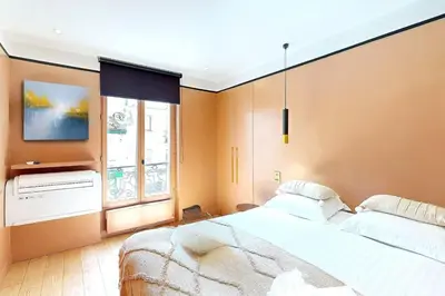 Un ou plusieurs lits dans un hébergement de l'établissement 179 Suite Mayou - Superbe Appartement à Paris