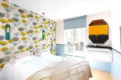 Un ou plusieurs lits dans un hébergement de l'établissement 179 Suite Mayou - Superbe Appartement à Paris