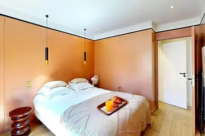 Un ou plusieurs lits dans un hébergement de l'établissement 179 Suite Mayou - Superbe Appartement à Paris