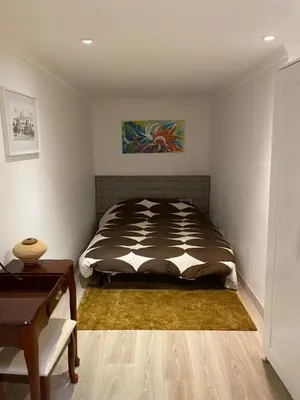 Un ou plusieurs lits dans un hébergement de l'établissement Cosy, charming apartment with courtyard