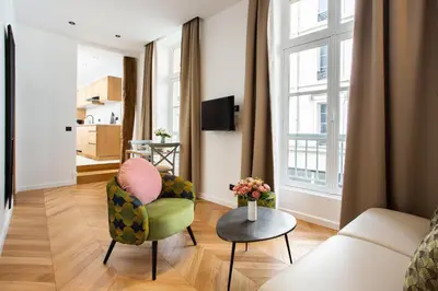 Télévision ou salle de divertissement dans l'établissement CMG Résidence République - Rue Béranger