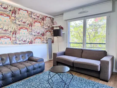 Coin salon dans l'établissement FRUITIERS2 - Bright 3 BR 15' away from the center of Paris
