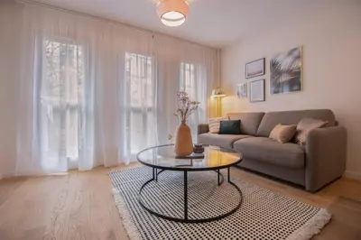 Coin salon dans l'établissement GuestReady - Apt near Parc de la Villette