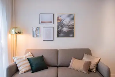Coin salon dans l'établissement GuestReady - Apt near Parc de la Villette