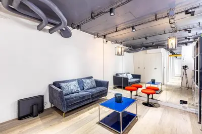 Coin salon dans l'établissement Modern Family Apartment Next To The Eiffel Tower