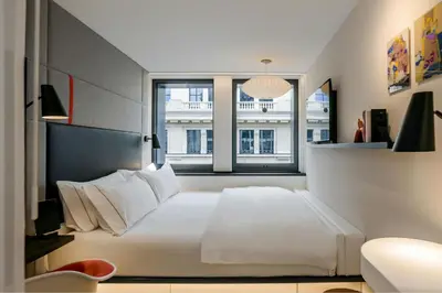 Un ou plusieurs lits dans un hébergement de l'établissement citizenM Paris Champs-Élysées