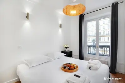 Un ou plusieurs lits dans un hébergement de l'établissement Splendid apartment - 2BR-6P - Place des Vosges