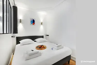 Un ou plusieurs lits dans un hébergement de l'établissement Splendid apartment - 2BR-6P - Place des Vosges