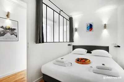 Un ou plusieurs lits dans un hébergement de l'établissement Splendid apartment - 2BR-6P - Place des Vosges