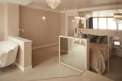 Un ou plusieurs lits dans un hébergement de l'établissement Paris j'Adore Hotel & Spa