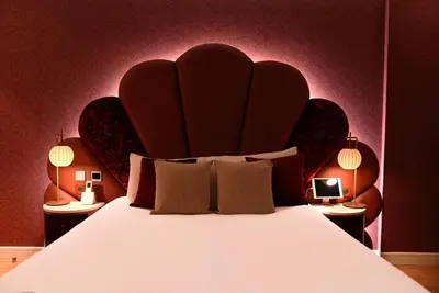 Un ou plusieurs lits dans un hébergement de l'établissement Paris j'Adore Hotel & Spa