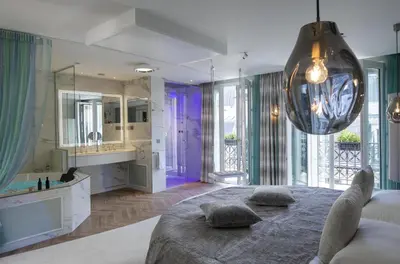 Un ou plusieurs lits dans un hébergement de l'établissement Paris j'Adore Hotel & Spa