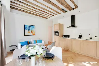 Cuisine ou kitchenette dans l'établissement CMG Résidence République II - Rue Béranger