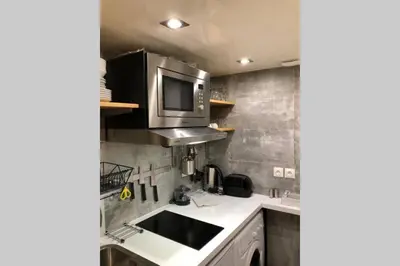 Cuisine ou kitchenette dans l'établissement Studio Cinq Diamants, Neuf Tout équipé