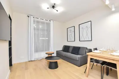 Coin salon dans l'établissement Peaceful apartment - 2BR-6P - Trocadero