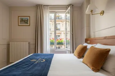 Un ou plusieurs lits dans un hébergement de l'établissement Hotel Havane Opera