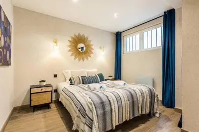Un ou plusieurs lits dans un hébergement de l'établissement Nation-Charonne II Charming Apartment 1BR-4P