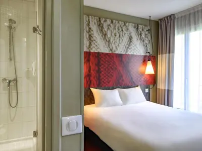 Un ou plusieurs lits dans un hébergement de l'établissement ibis Paris Tour Montparnasse 15eme