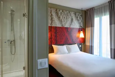 Un ou plusieurs lits dans un hébergement de l'établissement ibis Paris Tour Montparnasse 15eme