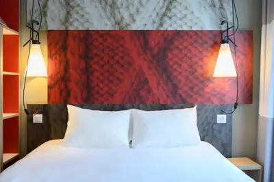 Un ou plusieurs lits dans un hébergement de l'établissement ibis Paris Tour Montparnasse 15eme