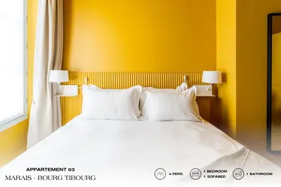 Un ou plusieurs lits dans un hébergement de l'établissement Beauquartier - Marais Bourg Tibourg