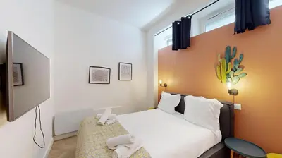 Un ou plusieurs lits dans un hébergement de l'établissement 180 Suite Steph - Superbe Appartement à Paris