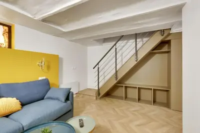 Coin salon dans l'établissement 180 Suite Steph - Superbe Appartement à Paris