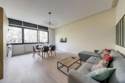 Coin salon dans l'établissement 188 Suite Eight - Superb apartment in Paris