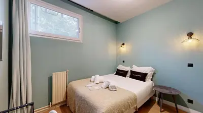 Un ou plusieurs lits dans un hébergement de l'établissement 188 Suite Eight - Superb apartment in Paris