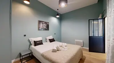 Un ou plusieurs lits dans un hébergement de l'établissement 188 Suite Eight - Superb apartment in Paris