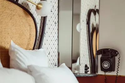 Un ou plusieurs lits dans un hébergement de l'établissement Hotel Panache