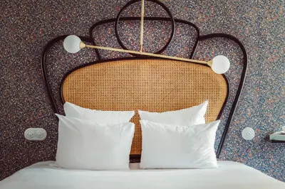 Un ou plusieurs lits dans un hébergement de l'établissement Hotel Panache
