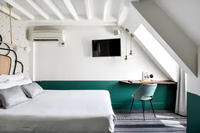 Télévision ou salle de divertissement dans l'établissement Hotel Panache