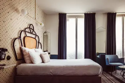 Un ou plusieurs lits dans un hébergement de l'établissement Hotel Panache