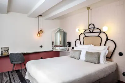 Un ou plusieurs lits dans un hébergement de l'établissement Hotel Panache