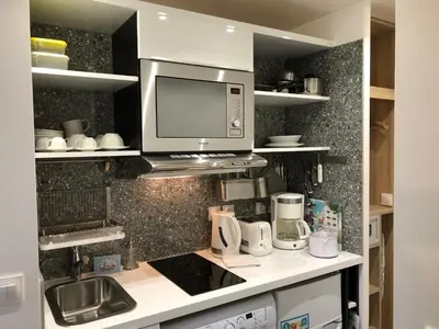 Cuisine ou kitchenette dans l'établissement Résidence Labyrinthe