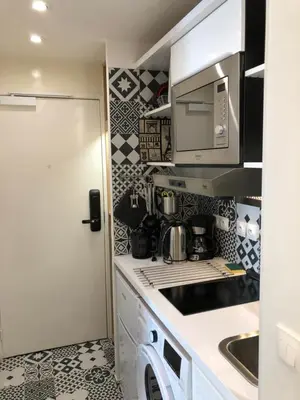 Cuisine ou kitchenette dans l'établissement Résidence Labyrinthe