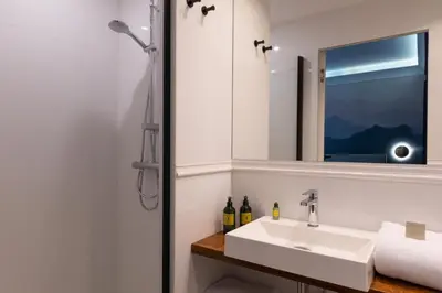 Salle de bains dans l'établissement Hôtel Le Milie Rose