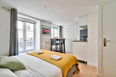 Un ou plusieurs lits dans un hébergement de l'établissement New and Bright Studio in the Heart of Paris (1G)