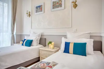 Un ou plusieurs lits dans un hébergement de l'établissement Charmant 150m2 5CH Romantic - Centre Ville - Clim