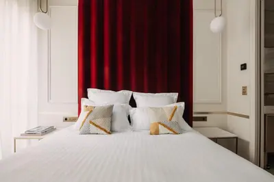 Un ou plusieurs lits dans un hébergement de l'établissement HIGHSTAY - Luxury Serviced Apartments - Champs-Elysées
