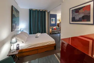 Un ou plusieurs lits dans un hébergement de l'établissement Appartement de la Tour - Welkeys