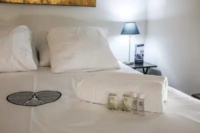 Un ou plusieurs lits dans un hébergement de l'établissement Appartement de la Tour - Welkeys