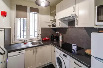 Cuisine ou kitchenette dans l'établissement Appartement de la Tour - Welkeys