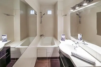 Salle de bains dans l'établissement Appartement de la Tour - Welkeys