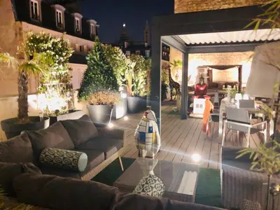 Coin salon dans l'établissement BEAUTIFUL PLACE WITH BREATHTAKING PRIVATE ROOFTOP TERRACE 210m2 IN CITY OF LOVE PARIS